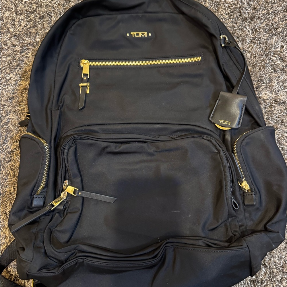 Tumi Jet Black Backpack with Gold Zippers